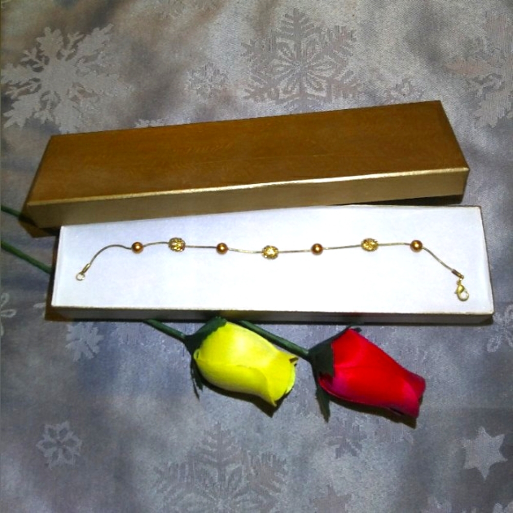 Copper Toned and Golden Bracelet